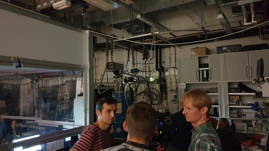 Ilya Akimov, Dmitriy Krizhanovskii and Alex Greilich (from left) consider experimental opportunities.